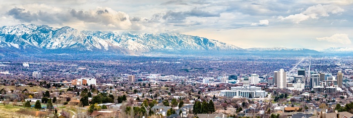 Utah cityscape with snow covered mountains